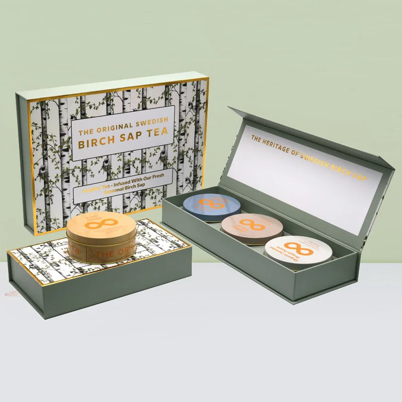 A rigid gift box with a printed sleeve and inserts