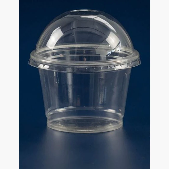 A clear cup with a domed lid